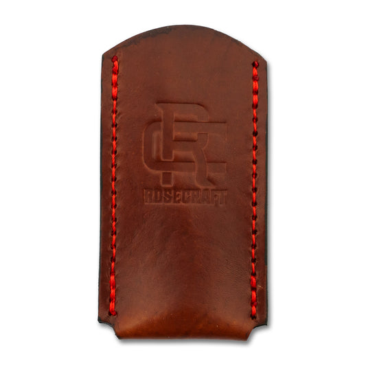 Front view of the RoseCraft Large Knife Slip in leather, showing the red stitching and embossed Locking RC logo.